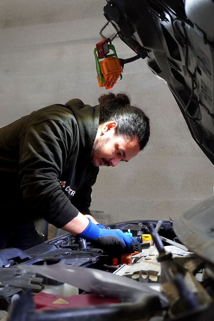diagnostic vehicule electrique en garage